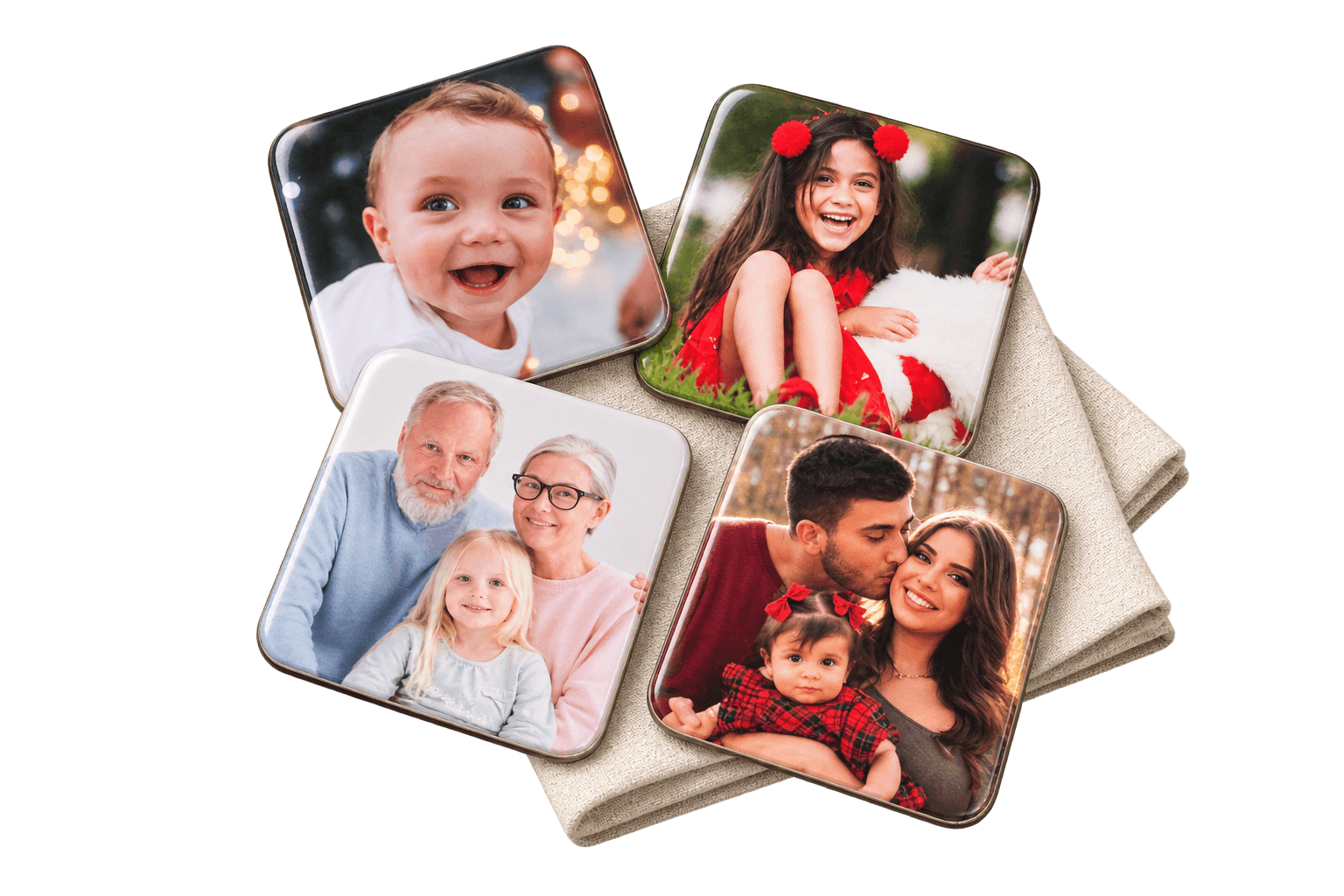 Four finished 2-inch photo magnets laid out on a linen surface