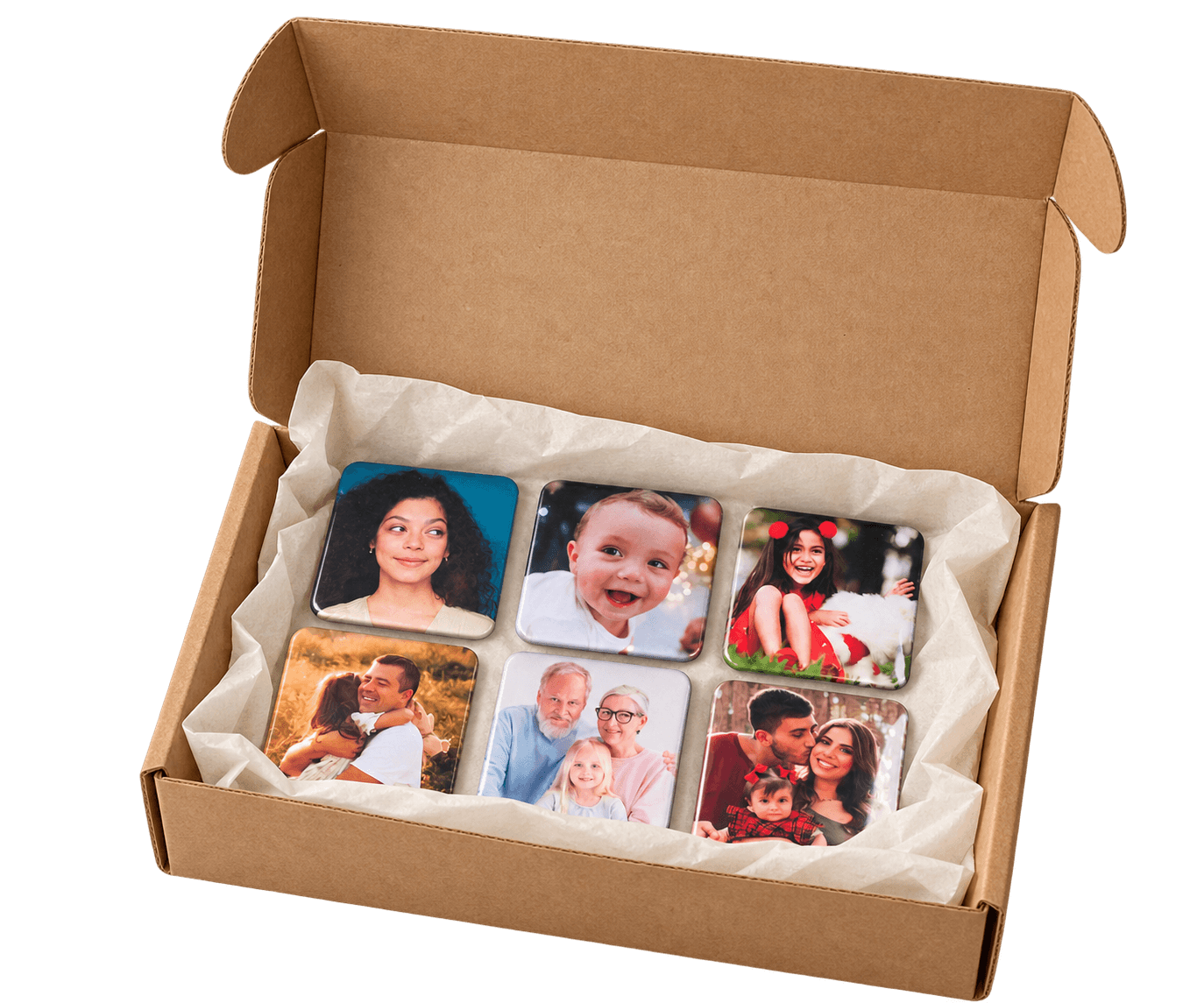 An open shipping box packed with finished photo magnets